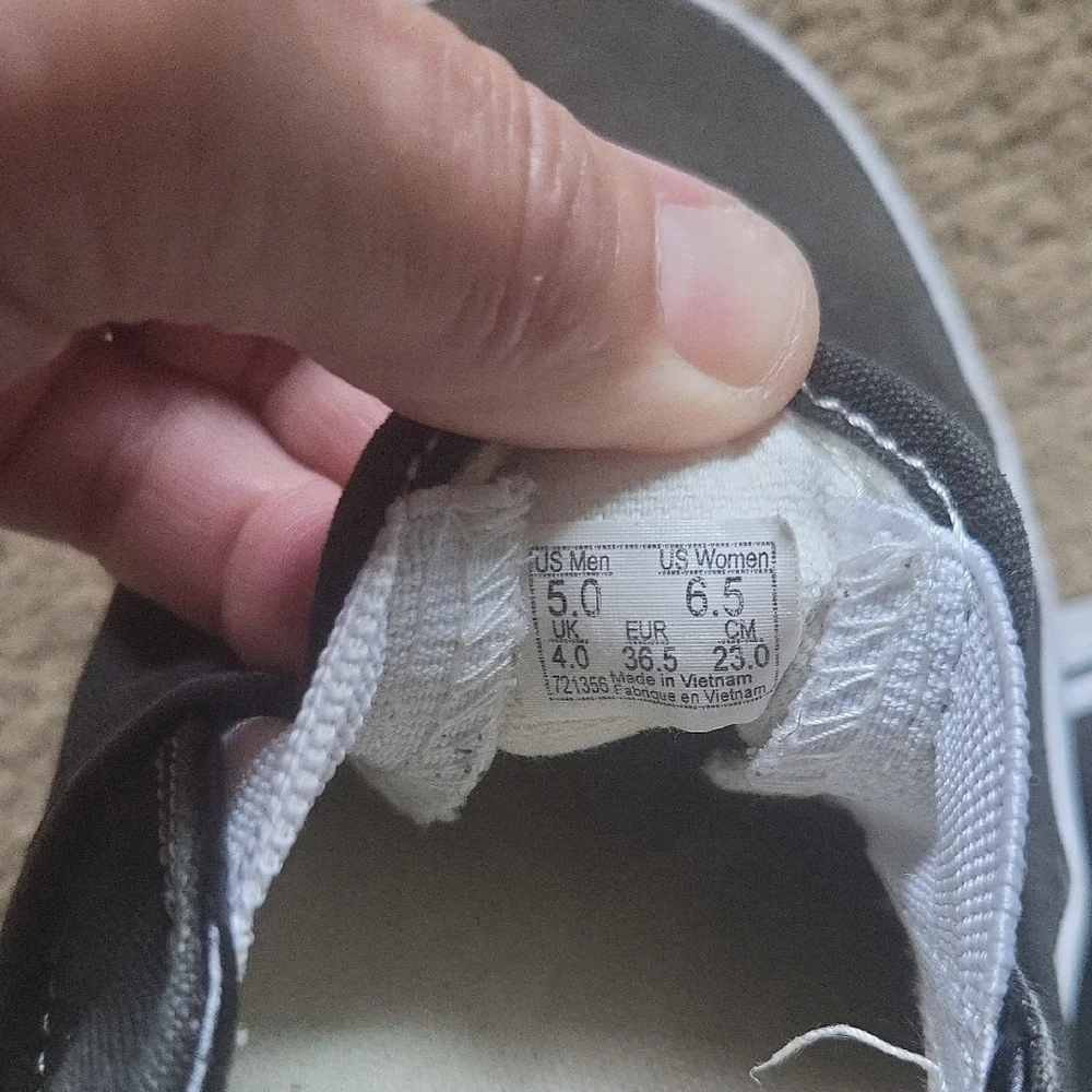 Vans Black and White Slip-On Sneakers - Picture 7 of 7